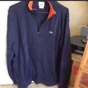 Men’s Lacoste 1/2 zip. Navy Blue, Orange trim. Size 9 (XXL) regular fit.